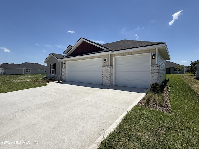 8340 Helmsley Blvd, Jacksonville, FL 32219 - ranch-style house with driveway, a garage, a front yard, brick siding, and a shingled roof