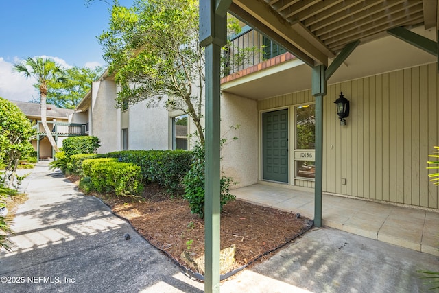 10136 Leisure Ln N Unit 26, Jacksonville, FL 32256 - property entrance with a balcony