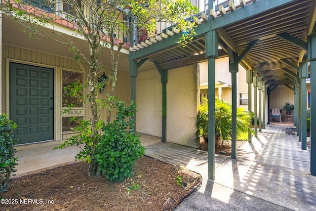 10136 Leisure Ln N Unit 26, Jacksonville, FL 32256 - view of exterior entry with stucco siding