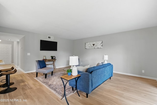 10136 Leisure Ln N Unit 26, Jacksonville, FL 32256 - living room with light wood-style flooring and baseboards