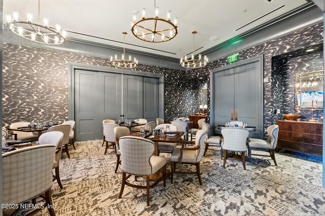 10136 Leisure Ln N Unit 26, Jacksonville, FL 32256 - carpeted dining area featuring wallpapered walls and a chandelier