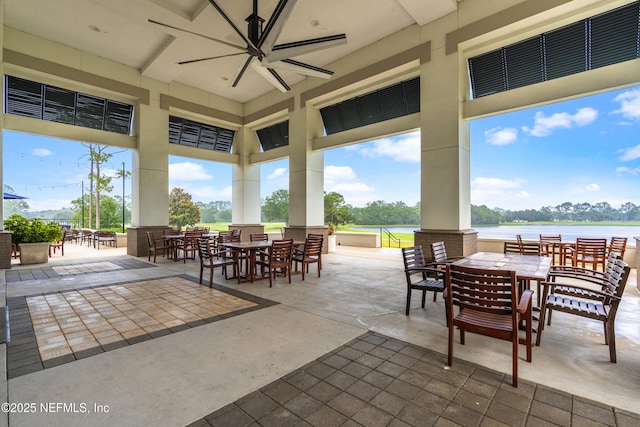 10136 Leisure Ln N Unit 26, Jacksonville, FL 32256 - view of patio / terrace with outdoor dining area, a water view, and a ceiling fan