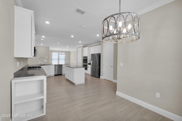 251 Dosel Ln, Saint Augustine, FL 32095 - kitchen featuring white cabinets, stainless steel appliances, visible vents, an inviting chandelier, and recessed lighting