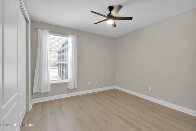 251 Dosel Ln, Saint Augustine, FL 32095 - unfurnished room with light wood-style flooring, baseboards, and ceiling fan