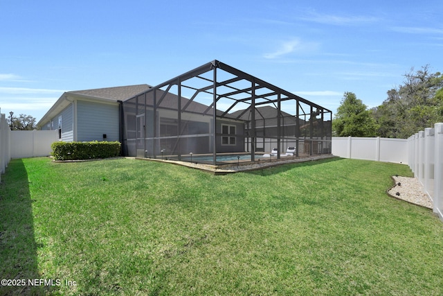 251 Dosel Ln, Saint Augustine, FL 32095 - back of property featuring a fenced in pool, a lawn, and a fenced backyard