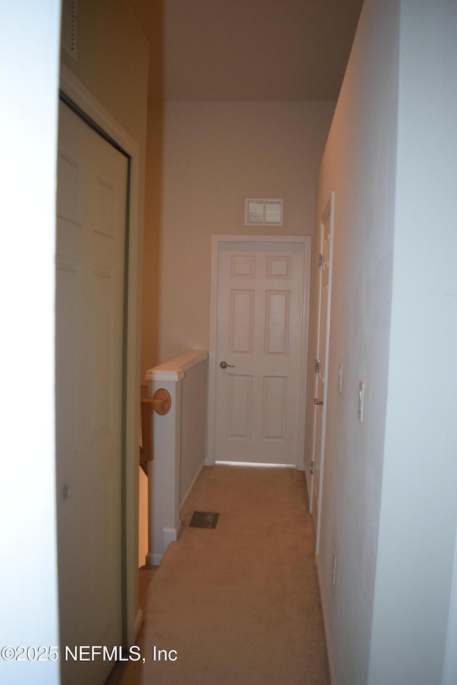 8133 Summerside Cir, Jacksonville, FL 32256 - hallway featuring light colored carpet and baseboards