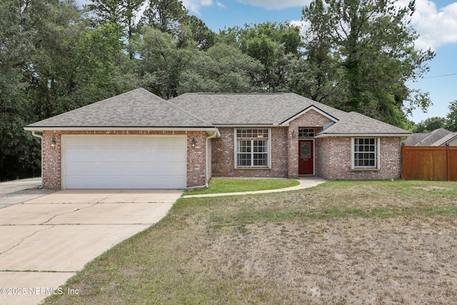 single story home with fence, a shingled roof, concrete driveway, and a garage