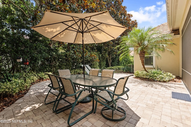 101 Dahlia Ct, Ponte Vedra Beach, FL 32082 - view of patio with outdoor dining area