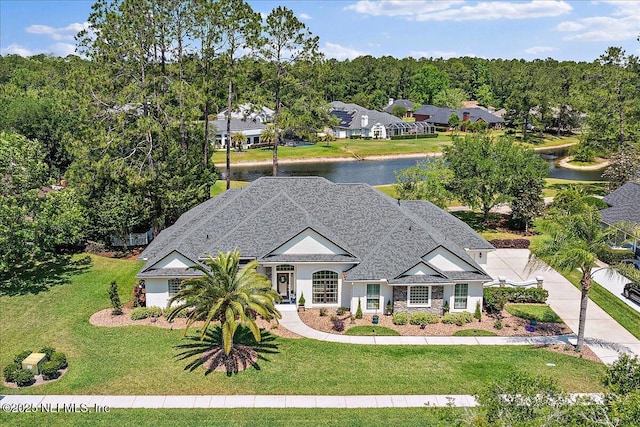 3241 Sequoyah Cir, Saint Johns, FL 32259 - view of front of property with a water view, a front yard, and stucco siding