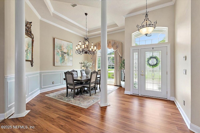 3241 Sequoyah Cir, Saint Johns, FL 32259 - foyer featuring a healthy amount of sunlight, ornamental molding, wood finished floors, and a chandelier