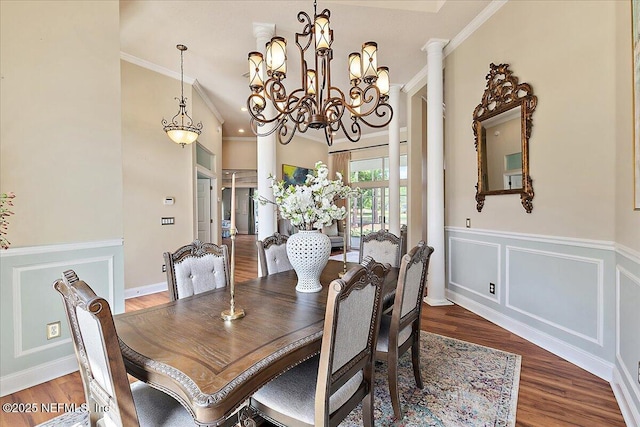 3241 Sequoyah Cir, Saint Johns, FL 32259 - dining space featuring crown molding, a wainscoted wall, wood finished floors, and a chandelier