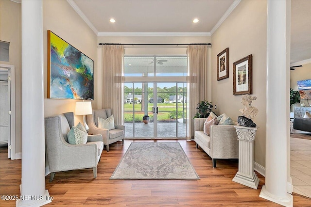 3241 Sequoyah Cir, Saint Johns, FL 32259 - interior space with ornate columns, ornamental molding, ceiling fan, and wood finished floors