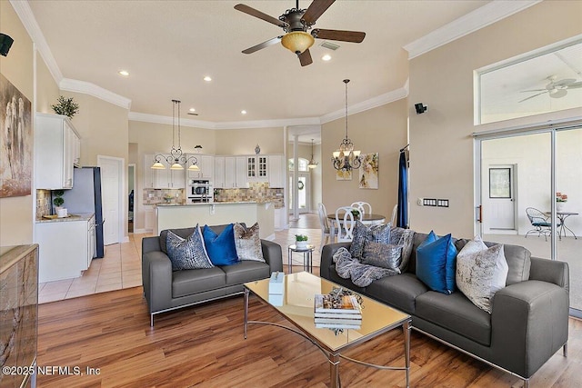 3241 Sequoyah Cir, Saint Johns, FL 32259 - living area with crown molding, ceiling fan with notable chandelier, and recessed lighting