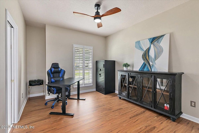 3241 Sequoyah Cir, Saint Johns, FL 32259 - office area with baseboards, a textured ceiling, ceiling fan, and wood finished floors