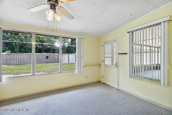 view of unfurnished sunroom