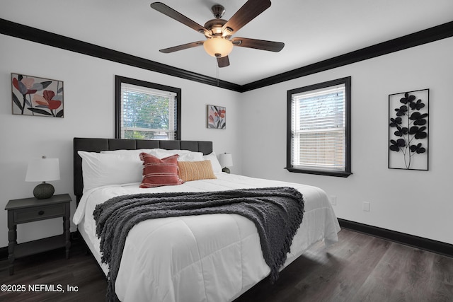 bedroom featuring baseboards, ceiling fan, ornamental molding, and wood finished floors