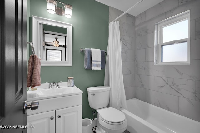 bathroom featuring vanity, shower / bath combination with curtain, and toilet