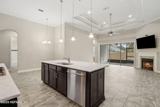 kitchen featuring dishwasher, marble finish floor, a sink, and visible vents