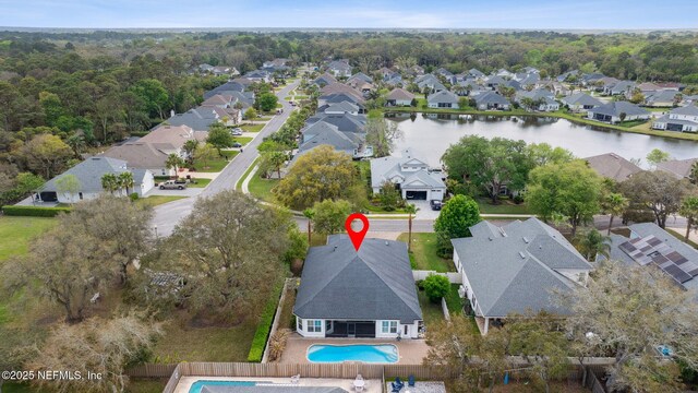 aerial view with a water view and a residential view
