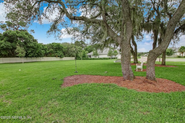 view of yard with fence