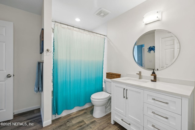 full bathroom featuring a shower with curtain, toilet, recessed lighting, wood finished floors, and vanity