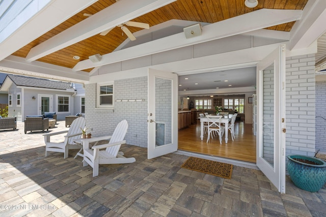 view of patio / terrace featuring ceiling fan