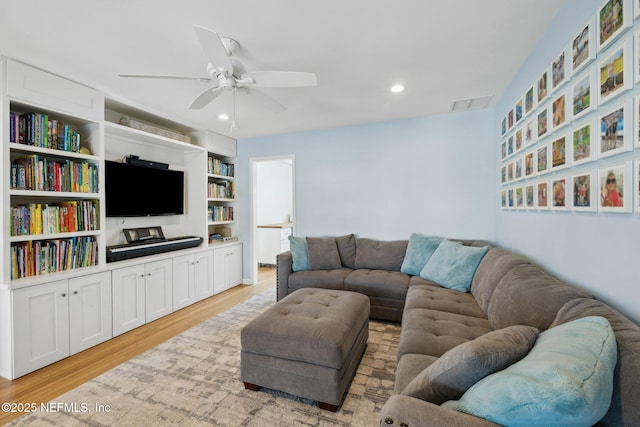 living area featuring visible vents, ceiling fan, light wood-style flooring, and recessed lighting