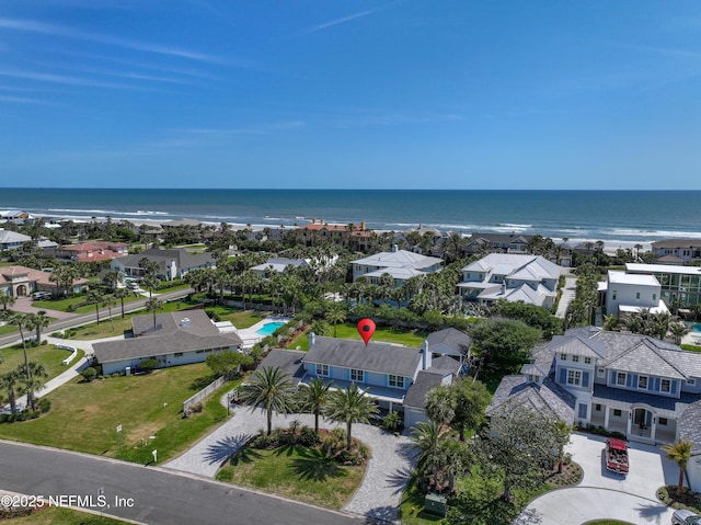 aerial view with a residential view and a water view