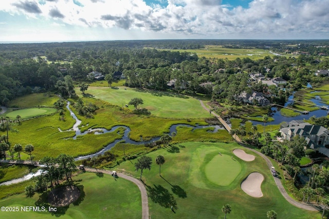 birds eye view of property featuring a water view and view of golf course