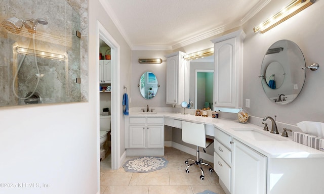 bathroom with a shower stall, ornamental molding, a sink, and double vanity