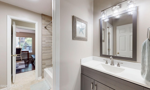 full bathroom featuring vanity and a shower