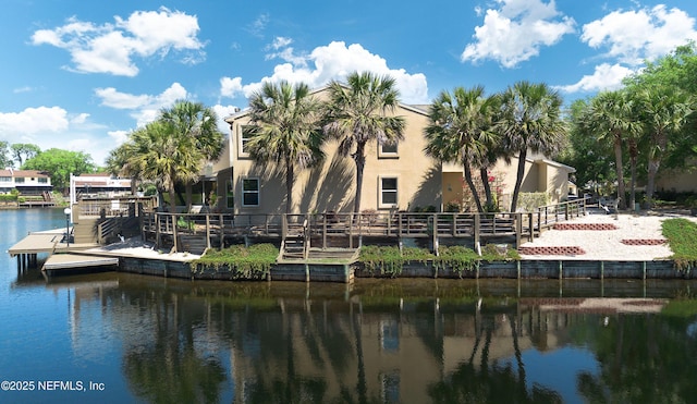 exterior space with a water view
