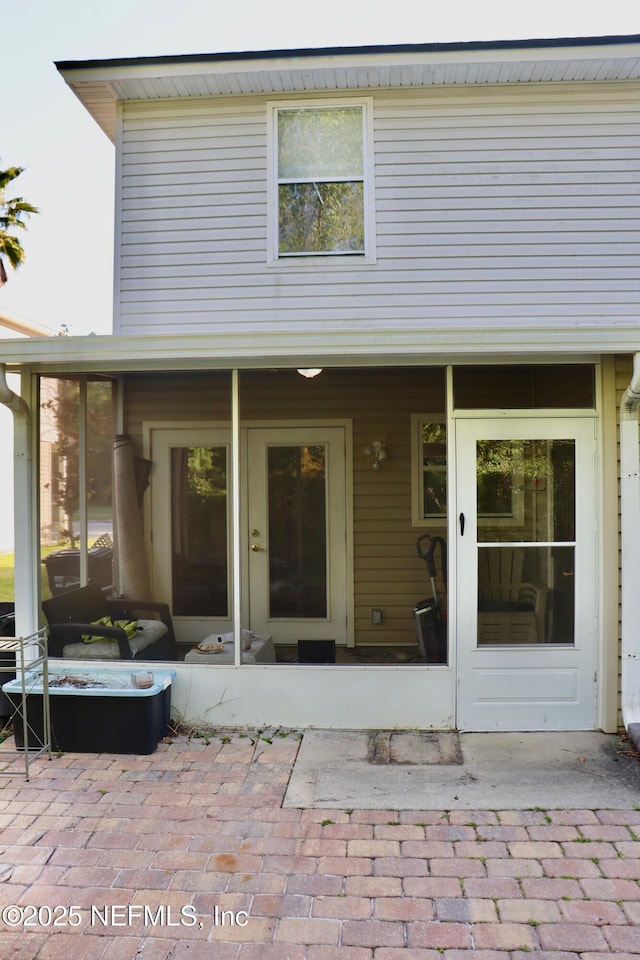 rear view of house featuring a patio area
