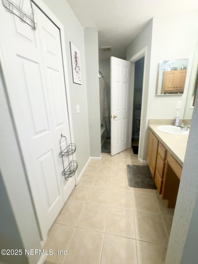 1845 Lago Del Sur Dr, Middleburg, FL 32068 - bathroom featuring vanity, tile patterned flooring, and a shower with shower curtain