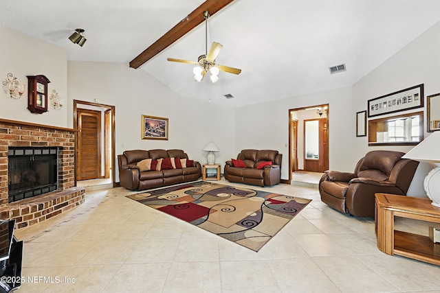 2629 Sandlewood Cir, Orange Park, FL 32065 - tiled living area featuring lofted ceiling with beams, a brick fireplace, visible vents, and ceiling fan