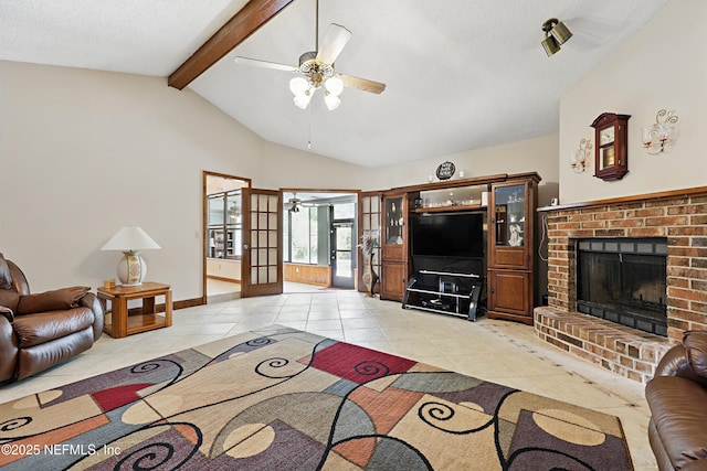 2629 Sandlewood Cir, Orange Park, FL 32065 - living room with light tile patterned floors, a ceiling fan, and lofted ceiling with beams