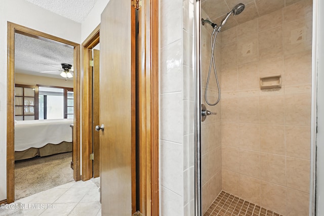 2629 Sandlewood Cir, Orange Park, FL 32065 - full bathroom with a textured ceiling, a ceiling fan, ensuite bath, and a stall shower