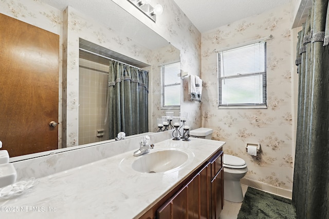 2629 Sandlewood Cir, Orange Park, FL 32065 - bathroom featuring wallpapered walls, toilet, vanity, baseboards, and curtained shower