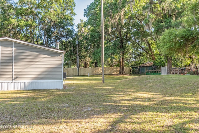 view of yard with fence