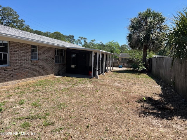 view of yard featuring a fenced backyard