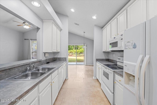 1884 Lake Forest Ln, Fleming Island, FL 32003 - kitchen featuring a sink, white appliances, white cabinets, lofted ceiling, and visible vents