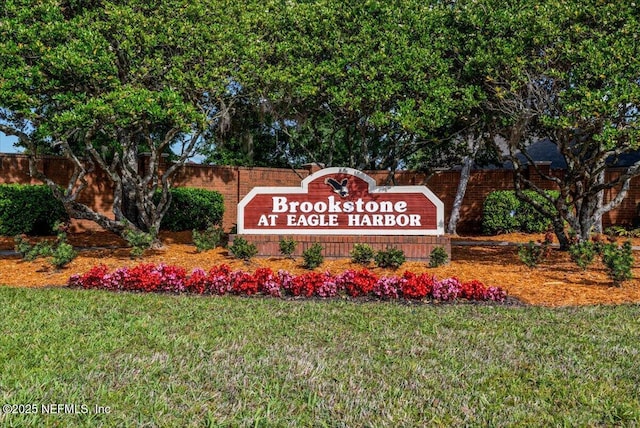 1884 Lake Forest Ln, Fleming Island, FL 32003 - community / neighborhood sign featuring a lawn