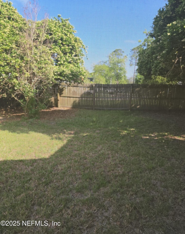 view of yard featuring fence