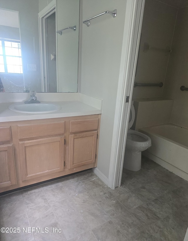 full bath featuring toilet and vanity