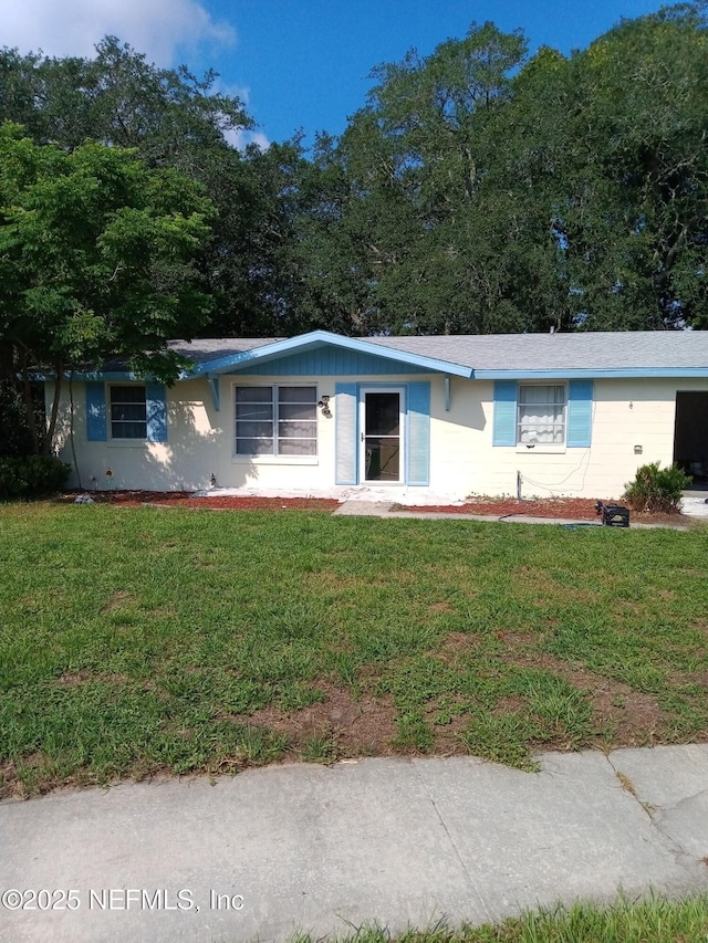 274 Hermosa Ct, Saint Augustine, FL 32086 - ranch-style house featuring a front lawn
