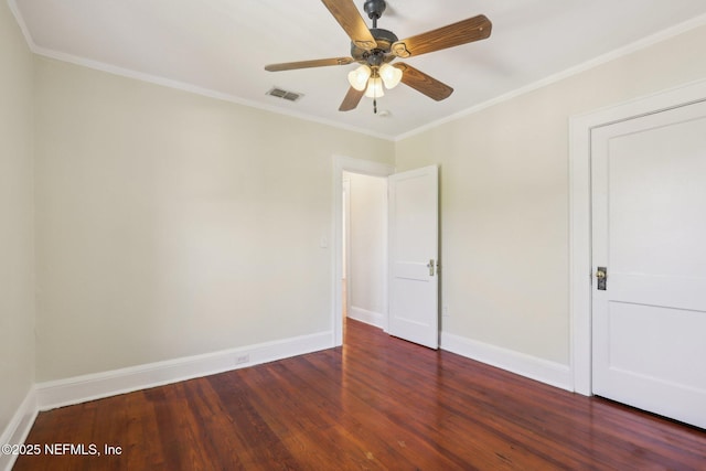unfurnished bedroom featuring baseboards, visible vents, wood finished floors, ceiling fan, and ornamental molding