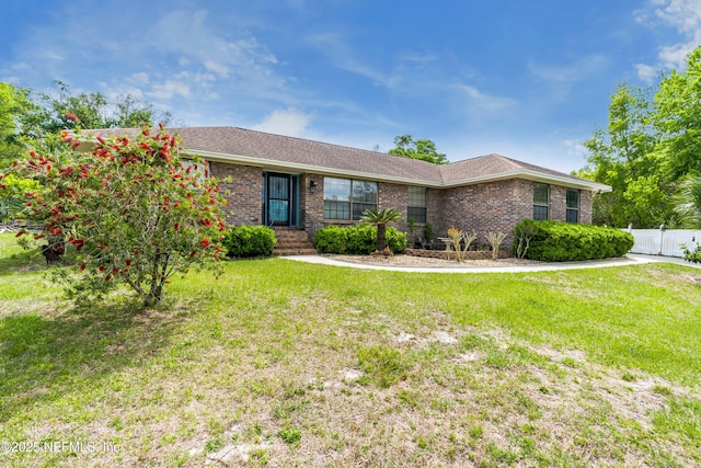 930 Ironridge Ct, Orange Park, FL 32065 - single story home featuring brick siding, a front lawn, and fence