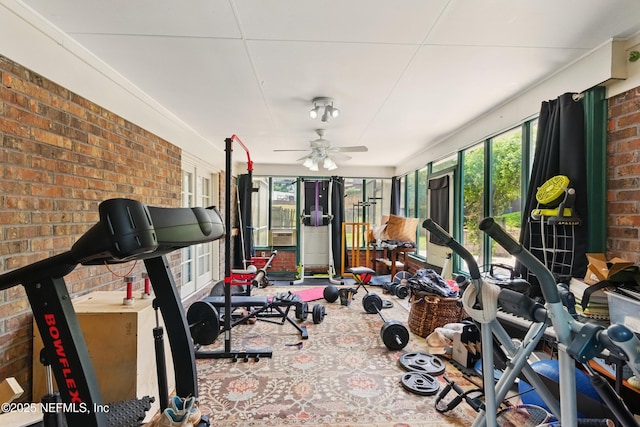 930 Ironridge Ct, Orange Park, FL 32065 - workout area with a wealth of natural light, a ceiling fan, and brick wall