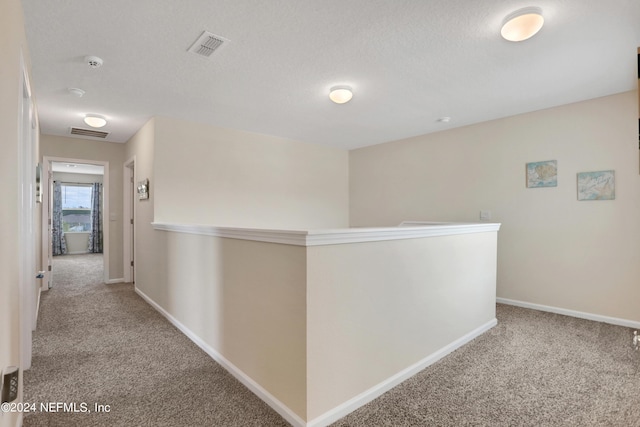 2235 Falling Star Ln, Green Cove Springs, FL 32043 - hall with carpet floors, visible vents, and baseboards