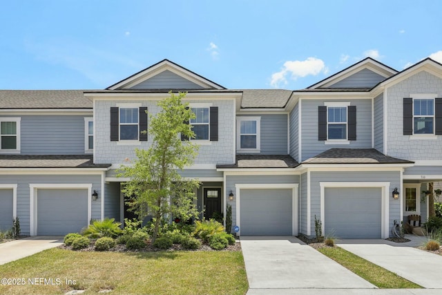 312 Anthony Dr, Jacksonville, FL 32218 - view of property featuring a garage, driveway, and a shingled roof
